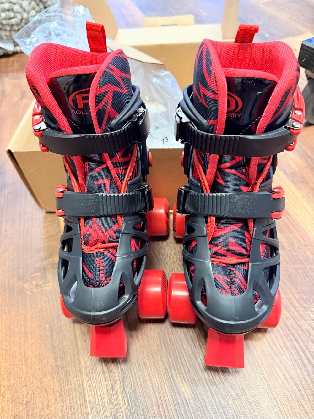 Roller Derby Kids Adjustable Quad Roller Skates in Red and Black